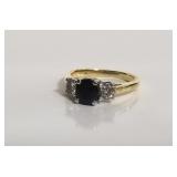 18k gold ring with diamond and blue topaz