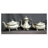 Box of vintage pewter tea pots