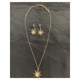 Gold tone sun necklace and earrings