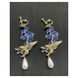 Blue and gold tone bird earrings