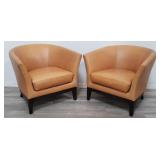 Pair of West Elm leather tulip chairs