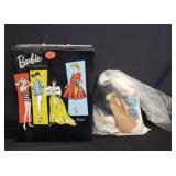 Group of vintage Barbie dolls and clothing