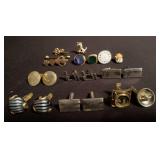 Group of cufflinks and tie clips