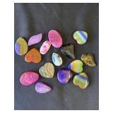 Group of 15 stone pendants