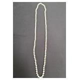 Single-strand pearl necklace with 14k white gold