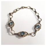 10k gold bracelet w/light blue spinel