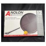 A Nolan high heat 12" round grill pan