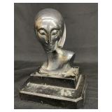 Antique woman bust on black base