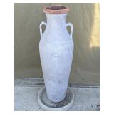 Terra-cotta planter on concrete base
