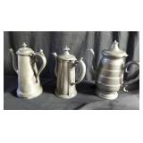 Group of pewter teapots