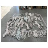 Group of ropes in a plastic barrel