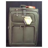 Delsey luggage on wheels, unused with tags