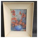 Floral oil painting on board .signed lower right