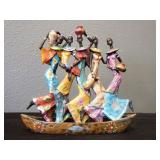 5 African women in canoe