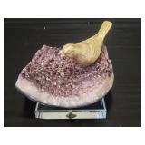 Composite amythist rock with bird mounted on
