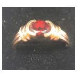 14 k yellow gold and garnet ring