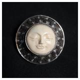 Sterling silver and stone moon face pendant