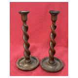 Pair of antique English oak candlesticks