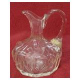 Vintage engraved floral design glass pitcher