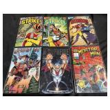 Group of vintage superhero comics