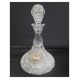 Cut crystal decanter w/ sterling silver scotch tag