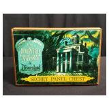 The haunted mansion secret panel chest