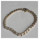 Diamond 14kt gold Bracelet.   8g , 7"L  , pb  , ac