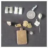 Group of military pins snd brooches.   Two are