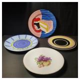 Group of four decorative plates