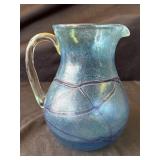 Vintage blue glass pitcher
