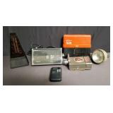 Box of vintage ER radio, clock, metronome, etc.