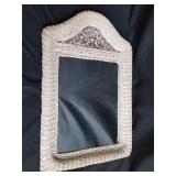 Carved wood, wicker framed wall mirror