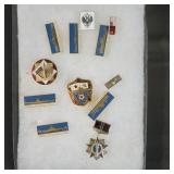 Group of replica military brooches