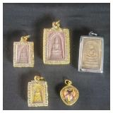 Group of Buddha pendants