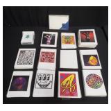 Large group of assorted cards in plastic sleeves