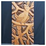 Carved wood parrot wall art