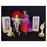 Group of 2 porcelain dolls & 2 musical ballerinas