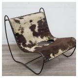 Mid-century modern cowhide & metal lounge chair