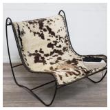 Mid-century modern cowhide & metal lounge chair
