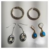 Group of sterling silver earrings, one with