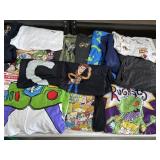 Large tub of Disney Pixar & Nickelodeon shirts,