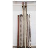 Bundle of Surveyors service leveling rod