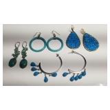 Group of four pairs of sterling silver earrings