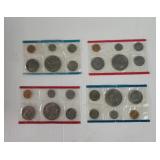 Four sets of U. S. Mint  1977 Uncirculated coins
