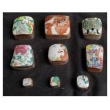 Group of hand painted porcelain-top metal