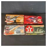 Four nascar 1:24 scale diecast cars