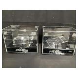 Pair of racing model car display cases in boxes