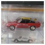 Four gallery showcases with 4 diecast