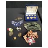 Collection of military pins and patches