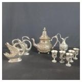 Box of silver plated tea pot.  Swan Napkin